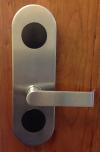 Silver door handle labeled SecureAll Lock.