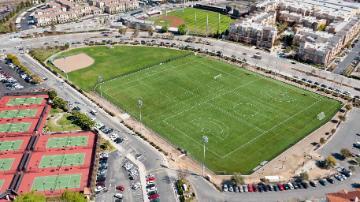 Aerial view of Bellomy Field surrounded by buildings and parking lots.