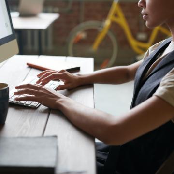 Student sitting at laptop 