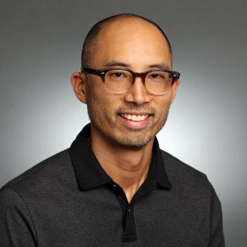 Professional photograph of Dean Ku