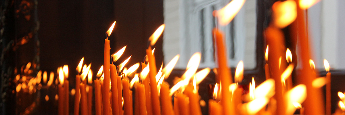 Photo of memorial votive candles.