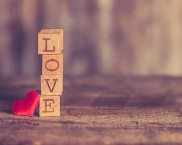 Stack of wooden blocks spelling LOVE