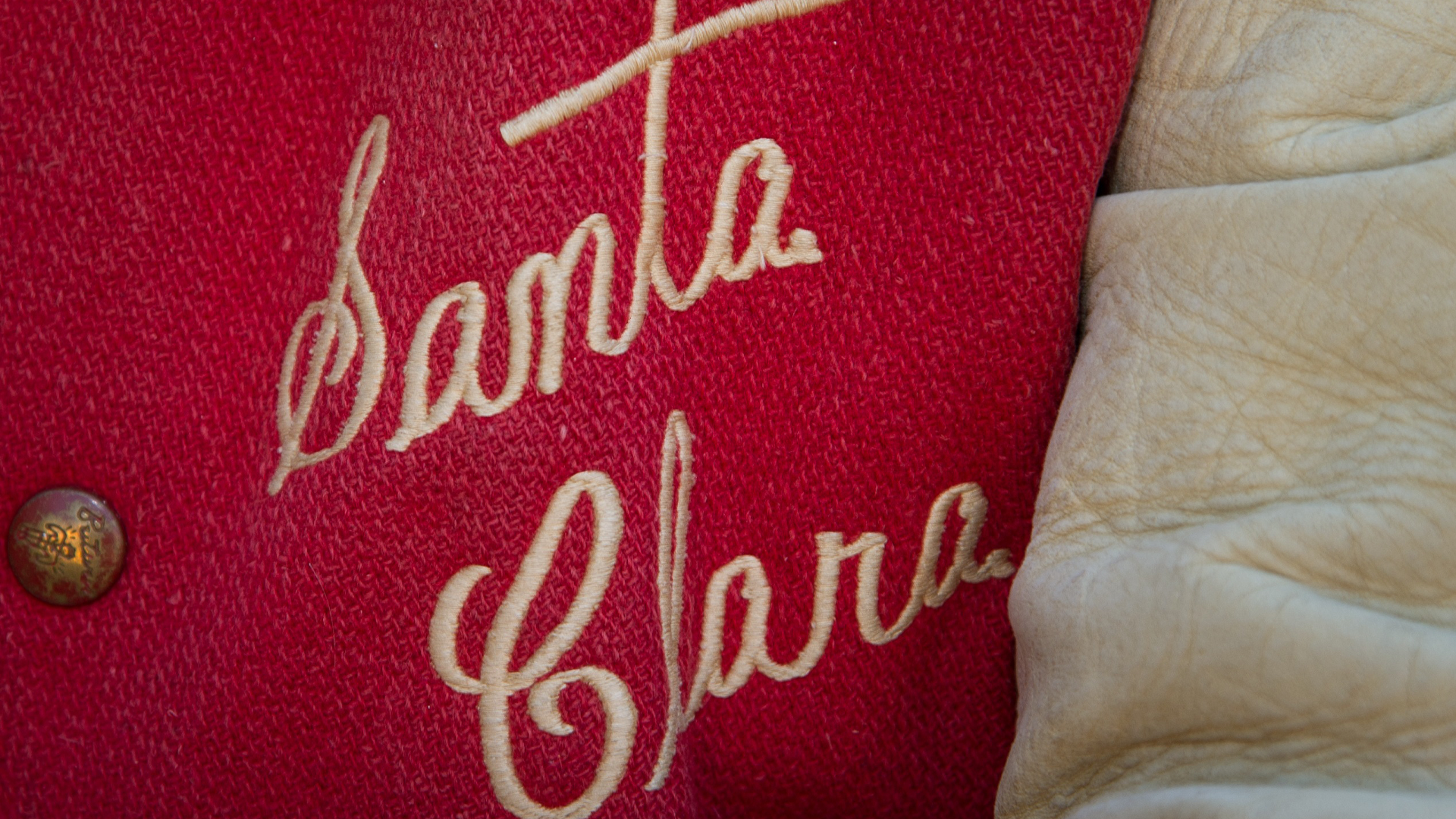 Letterman's jacket with Santa Clara spelled out in script font