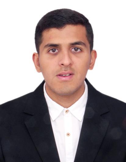 A person in a formal suit with a white background.