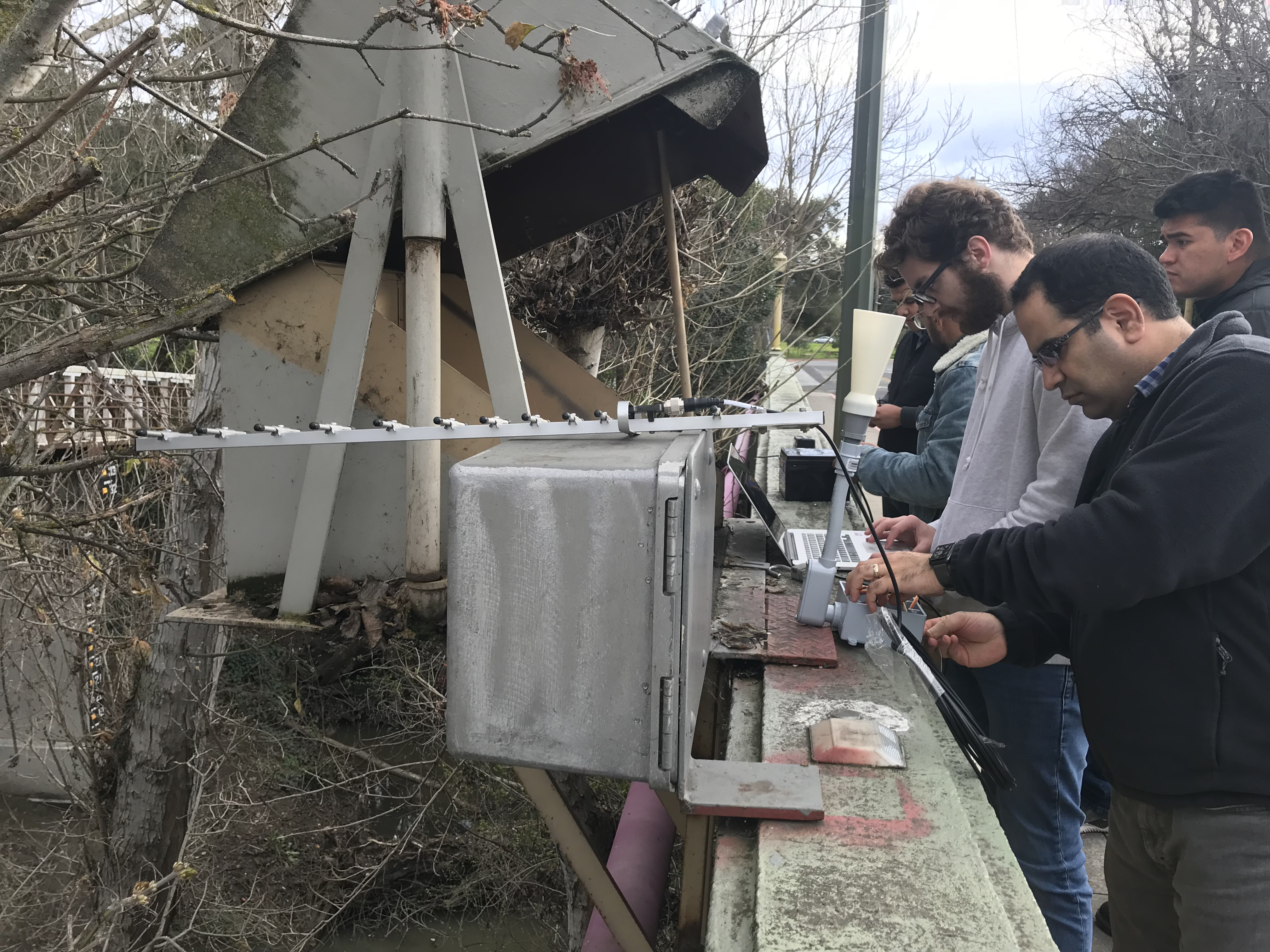 Students and advisor installing Flomosys in San Jose, CA