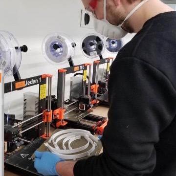 student producing 3d printed masks for the coronavirus pandemic