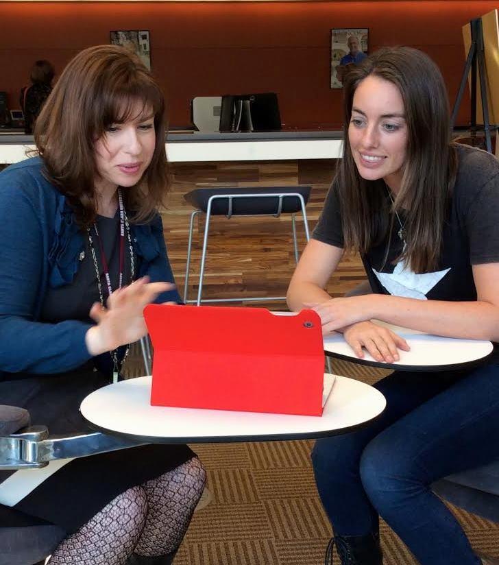 Librarian and student meeting.