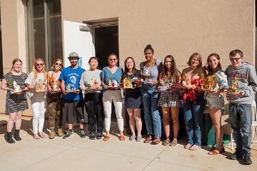 students lined up with their awards 