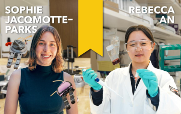 2 female students holding chemistry equipment and standing behind a lab bench