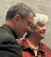 San Jose Bishop Oscar Cantú presenting award to Ana María Pineda