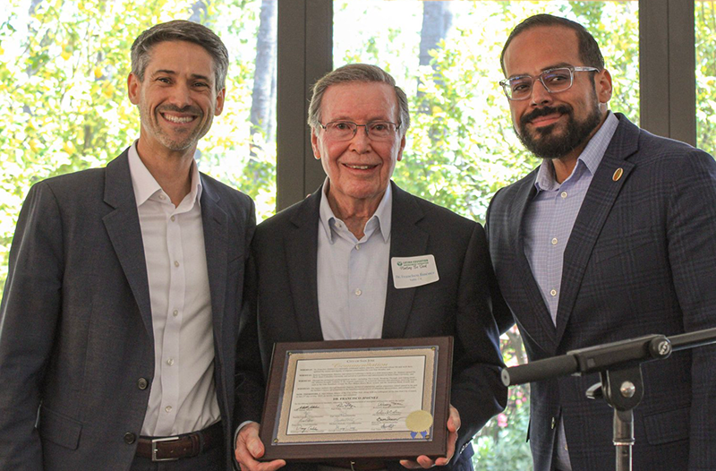 Matt Mahan, Mayor of the City of San José and Peter Ortiz, Councilman of the City of San José, and Francisco Jiménez holding the Commendation he received from the City Council of the City of San José