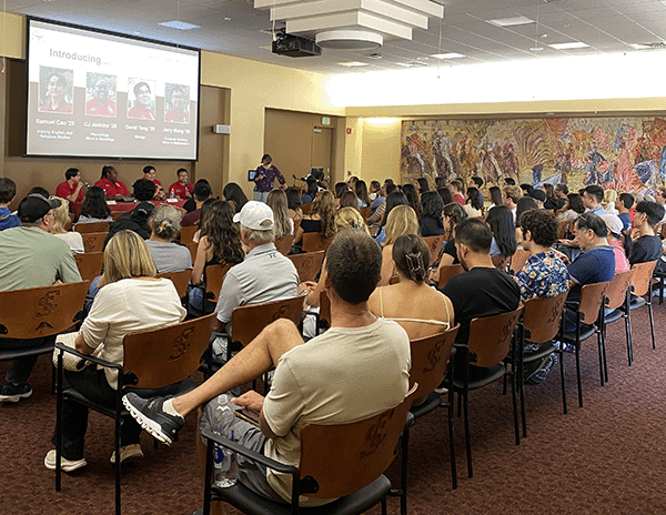 Kathy Aoki moderates a panel of CAS Ambassdors for a large audience in the Williman Room, Benson Center.