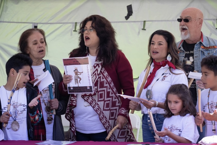 Members of the Muwekma Ohlone Tribe gather at an event 