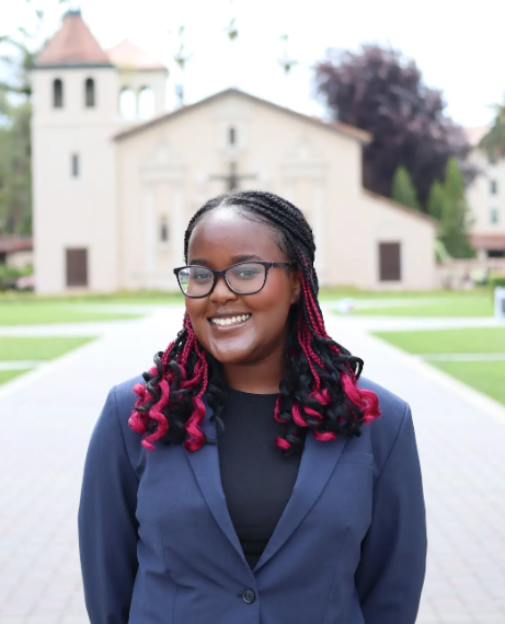 Tiffancy Kinyua headshot with the Mission Church in the background