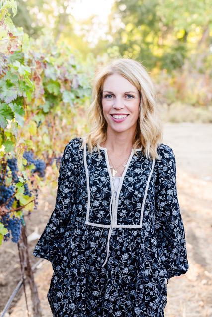Meg Gudeigersson in a vineyard
