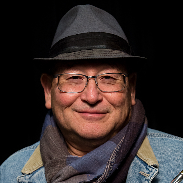 John Worley holding a trumpet