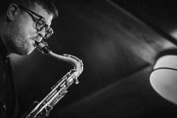 Carl Schultz playing the saxophone