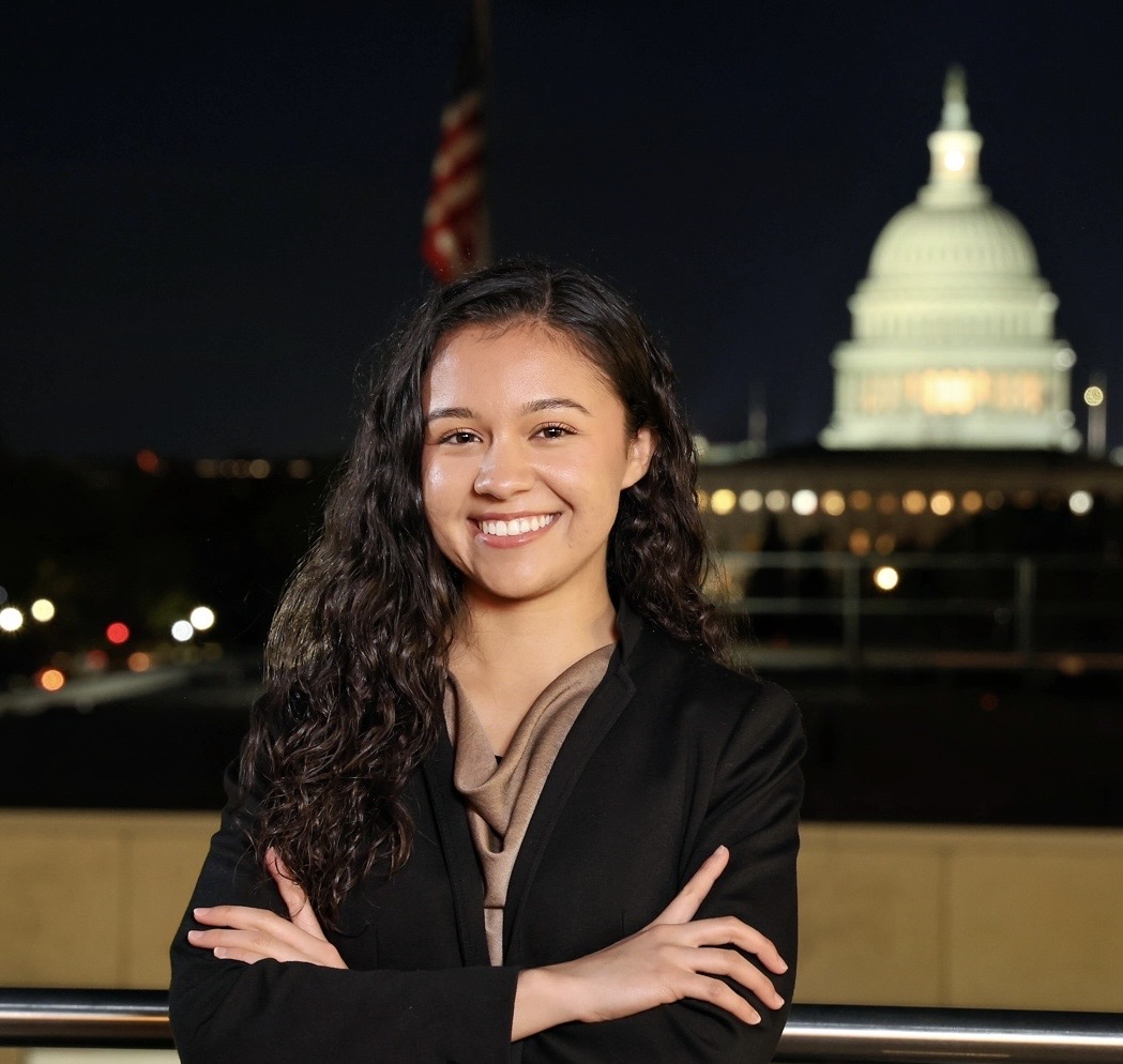 Rachel Alonzo poses in front of the United States Capitol building