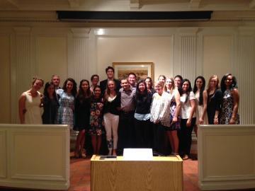 Group photo of a class in 2015, standing indoors.