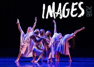 Dancers in colorful costumes under 