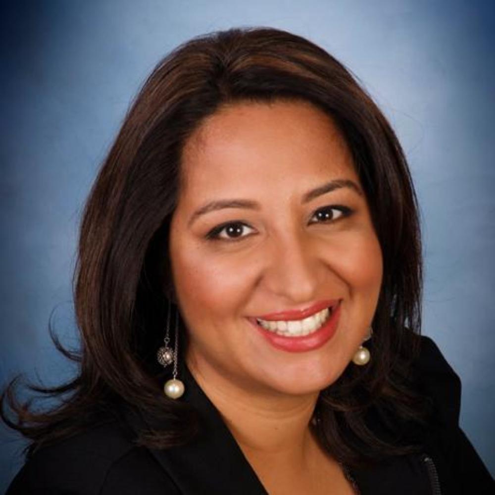 A headshot of a person named Michelle Mendoza