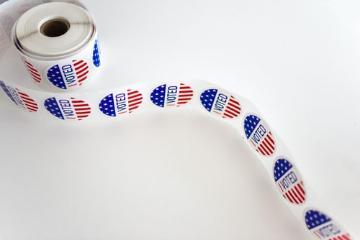 Roll of red, white, and blue pattern stickers with printed with 