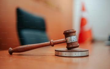 a wooden gaven sitting on top of a wooden table