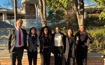 2025-26 SCU Ethics Bowl Team: Shelly Cormier, Darcy Muller, Tiffany Nguyen, Joshua Nesdahl, and Jenna Roseto, and Ethics Bowl Coach and SCU PhilosophyTeaching Professor Erin Bradfield. The team competed at the CA Regional Ethics Bowl on Dec. 6, 2025 at Grossmont College in El Cajon, CA. Photo courtesy of Erin Bradfield.