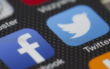 Facebook and Twitter company logos