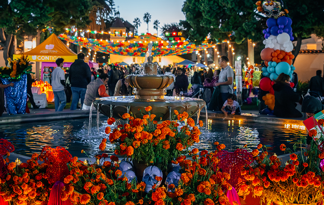 Photo of fountain with display for dia de los muertos