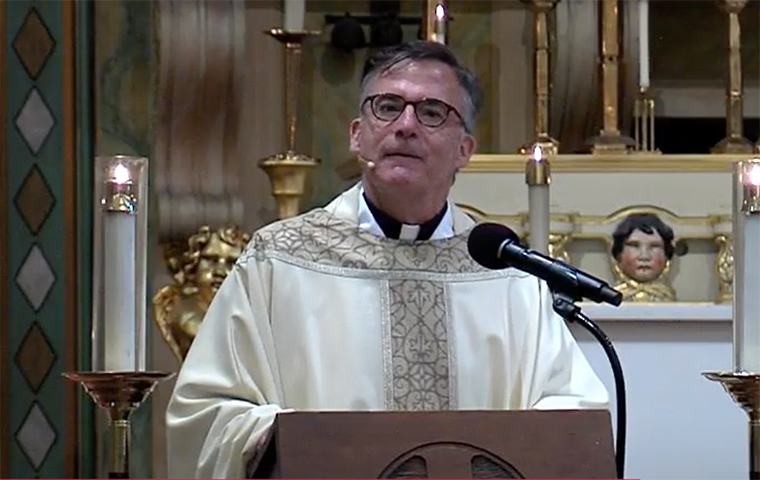 Fr. Kevin O'Brien delivering his homily at the Feast of St. Ignatius