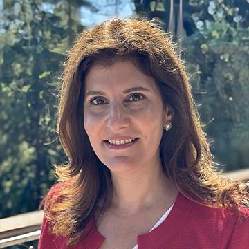 Suzy Papazian smiling outdoors