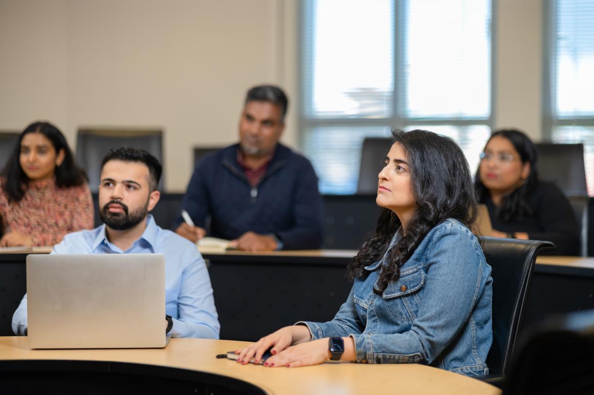 Leavey MBA students listening intently in a Lucas Hall classroom