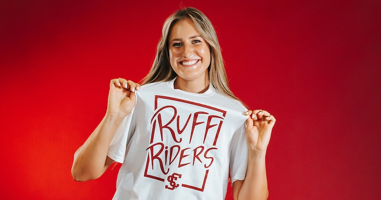 Lauren Grover wears Ruff Riders shirt she designed