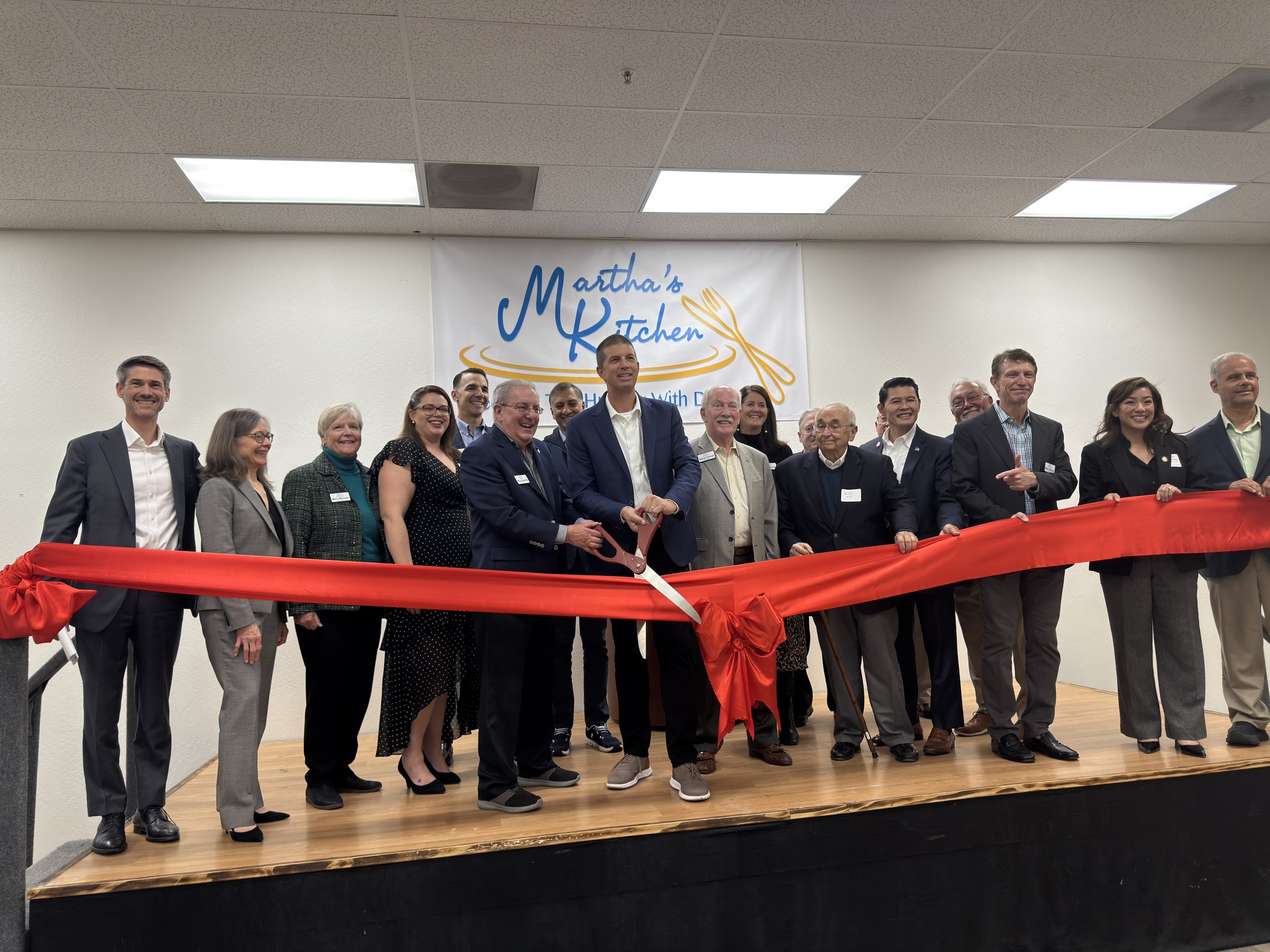 Ribbon Cutting at the Grand Opening of Martha's Kitchen Food Hub - Photo source Martha's Kitchen Facebook page.