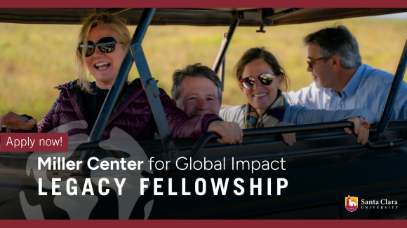 Four smiling adults in a safari-style vehicle. Text to the center left of the image reads