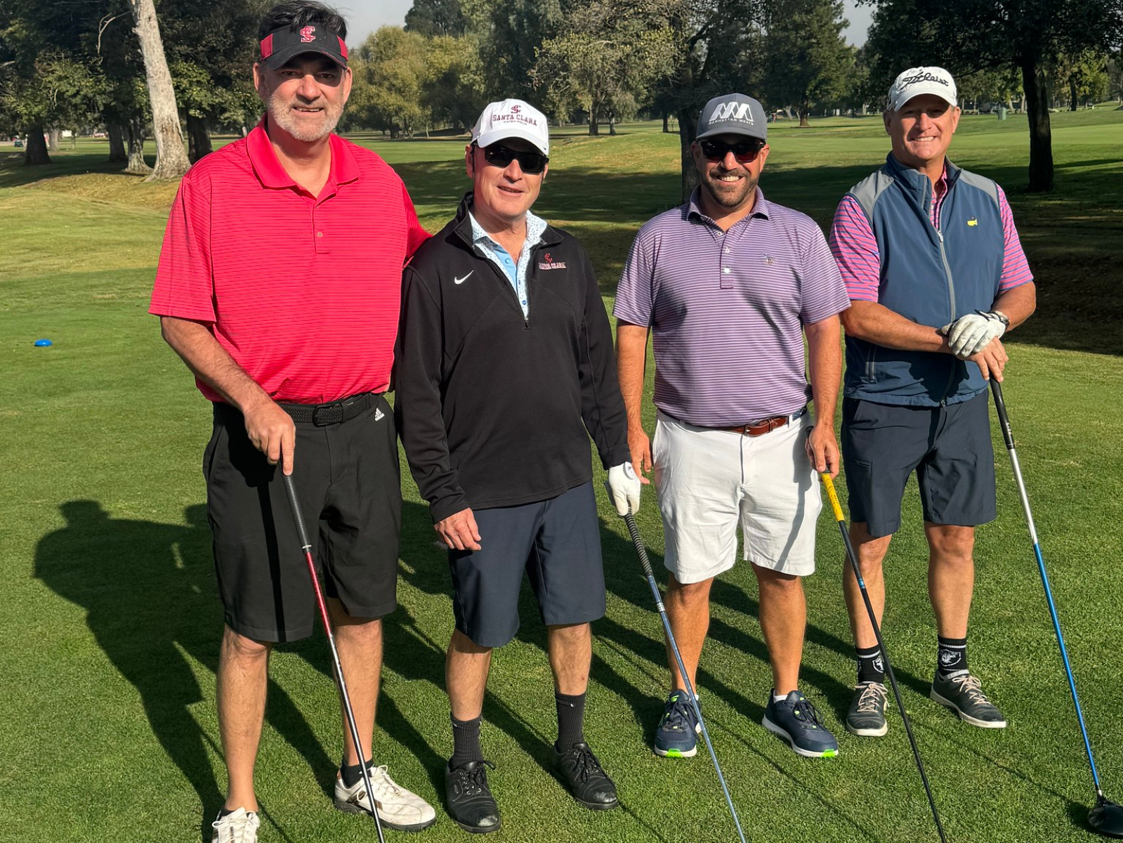 East Bay alumni golfers hold their putts
