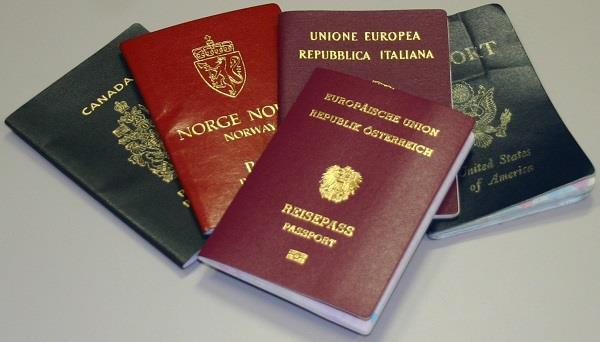 Various international passports displayed. - Passports Link to file