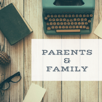 A typewriter, books, and papers around Parents & Family text.
