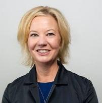 Portrait image of smiling woman with blond hair