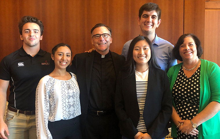 SCU president O'Brien with students