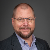 Paul-Gilbert-square-165x165