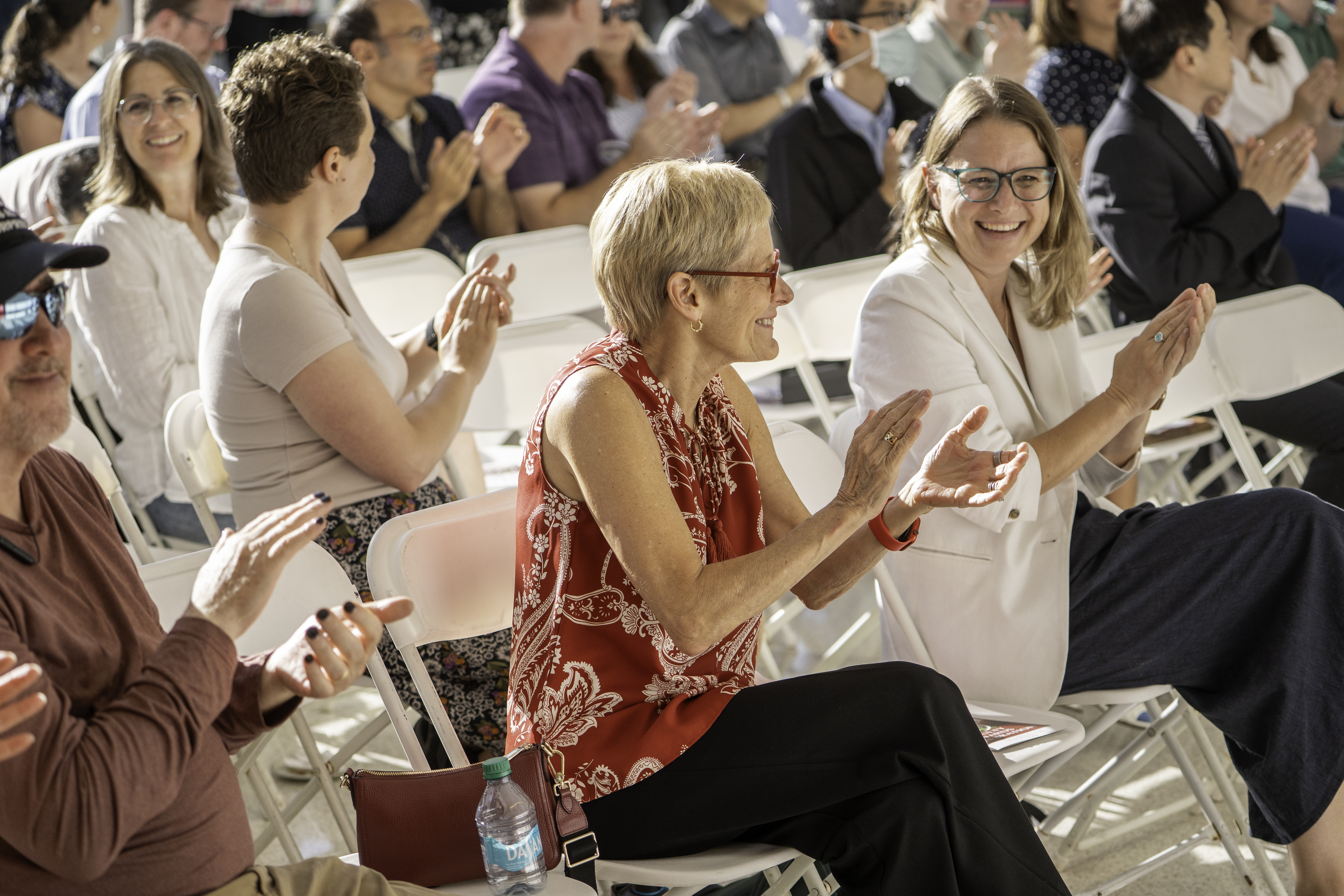 Person in pink sitting