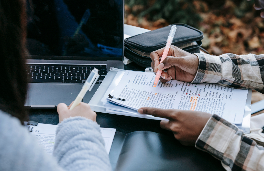 Students sitting together at the laptop 