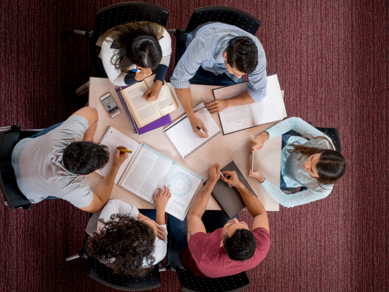 students sitting around the table