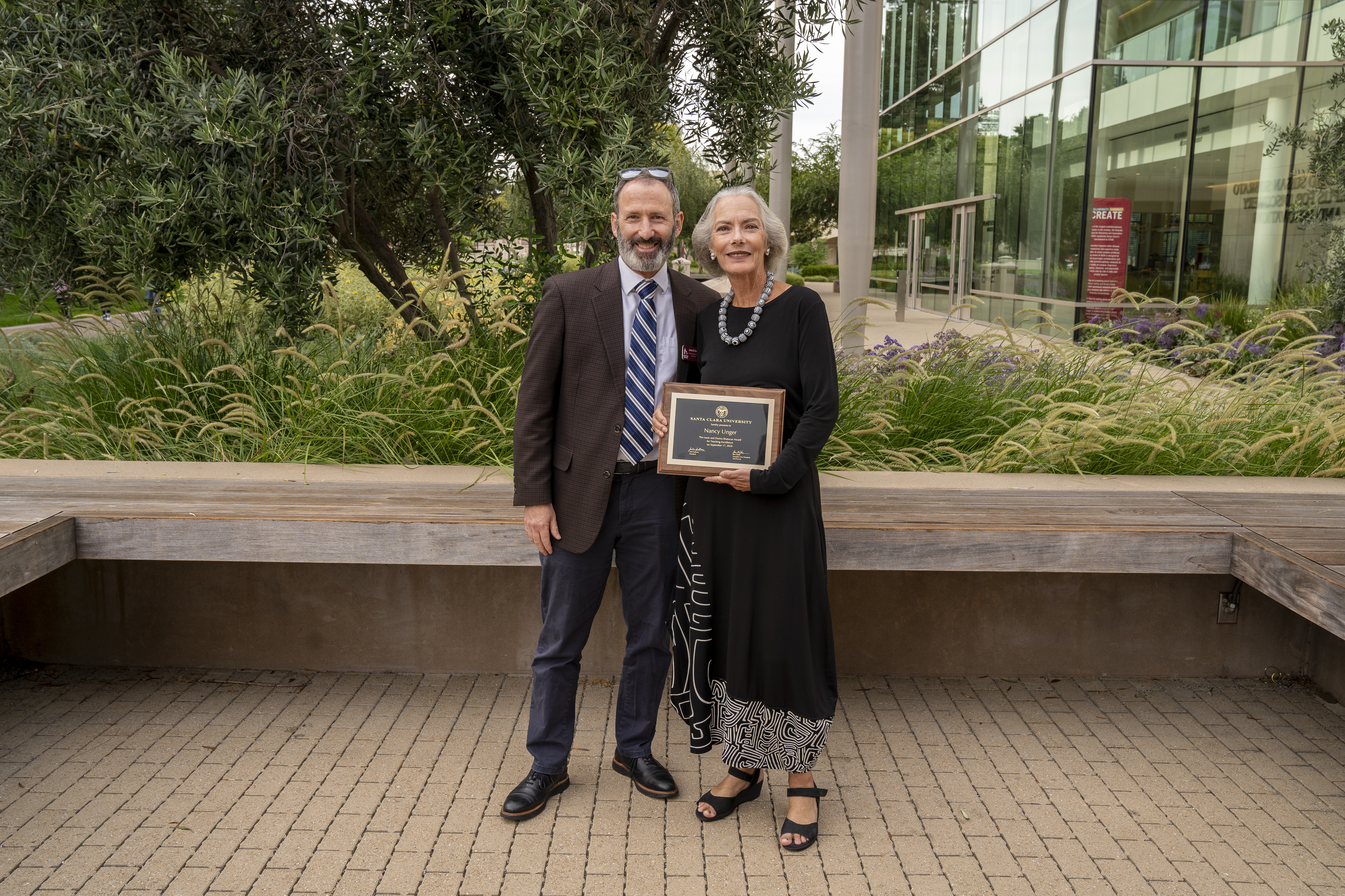 Nancy Unger and Jim Glaser posing for a picture