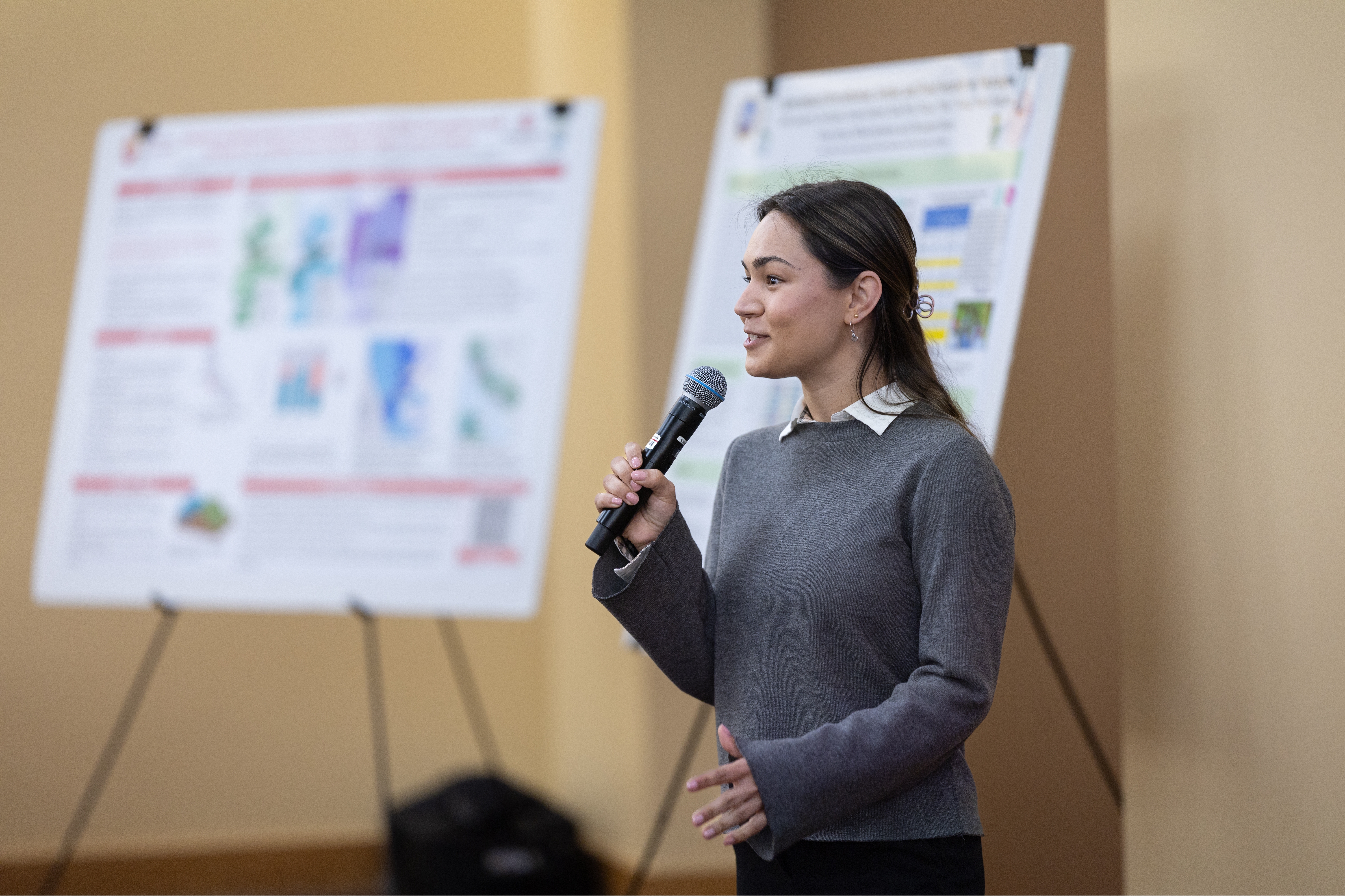 A student shares their research during the 2025 Sustainability and EJ Symposium.