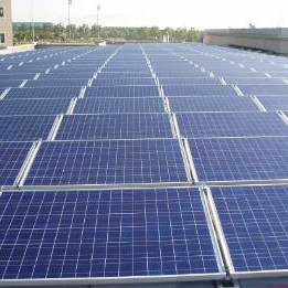 Rows of solar panels on a roof. Links to Power Systems and Sustainable Energy MS page.