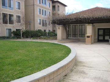 Courtyard with a curved grassy area and surrounding buildings labeled 'Sobrato Courtyard'.