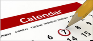 Pencil pointing at a circled date on a calendar.